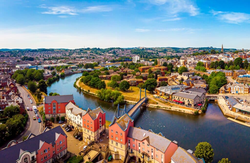 Aerial view of Exeter showing the river, buildings, and bridge