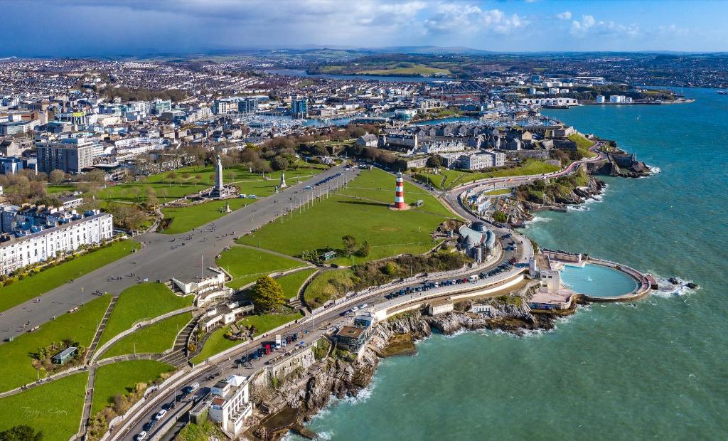 Aerial view of Plymouth Hoe with Smeaton's Tower lighthouse and coastline